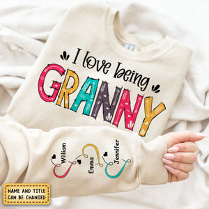 I Love Being Grandma - Family Personalized Custom Unisex Sweatshirt With Design On Sleeve - Christmas Gift For Mom, Grandma